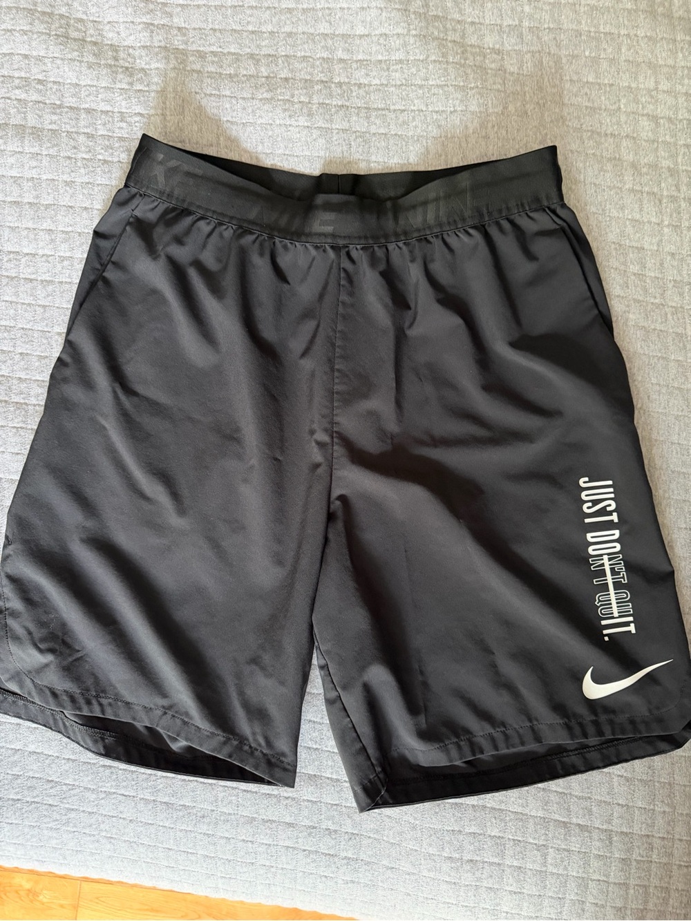 Nike Men’s Medium Black Athletic Shorts with White Swoosh & 'Just Don't Quit'